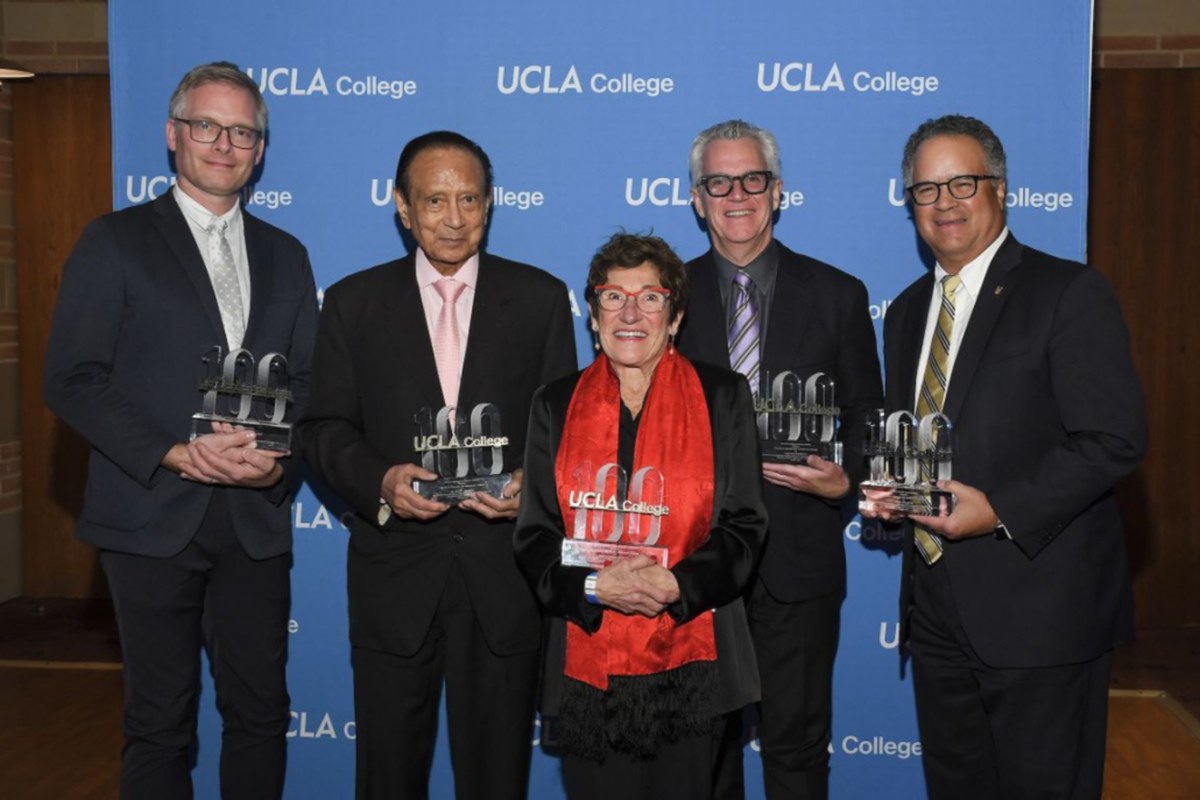 Dr. Bhaumik receiving a UCLA College 100 Visionary Award
